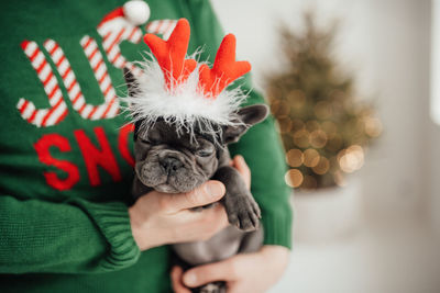 Midsection of woman with dog