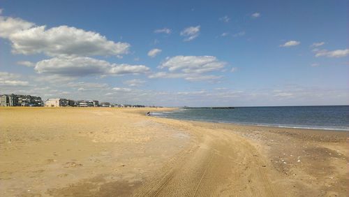 Scenic view of beach against sky