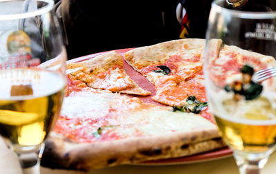Close-up of pizza served on table