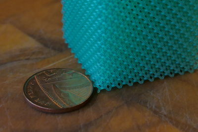 High angle view of coins on table