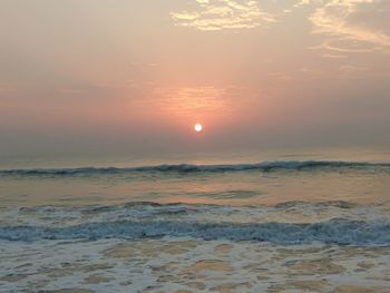 View of calm sea at sunset