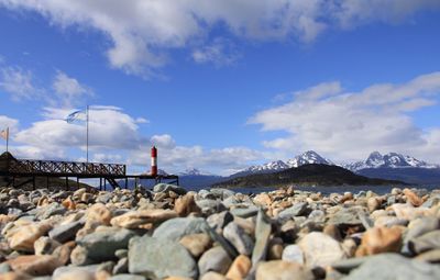 Scenic view of landscape against cloudy sky