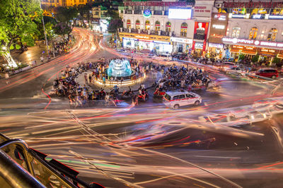 High angle view of light trails on city street at night