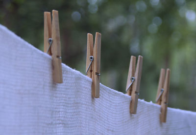 Close-up of laundry drying on clothesline