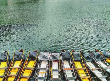 High angle view of boats moored in lake