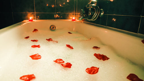 Bathtub with romantic atmosphere and scented candles