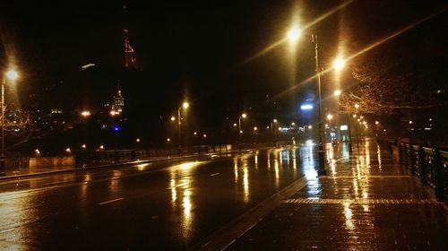 Illuminated street light at night