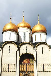 Low angle view of bell tower against sky