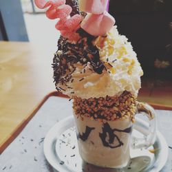 Close-up of cake with ice cream on table