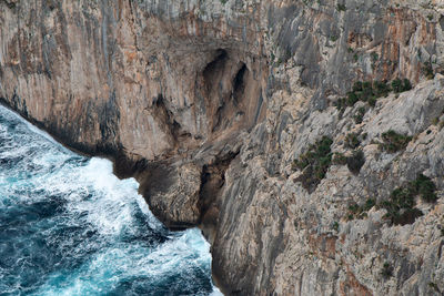 Scenic view of rock formation in water