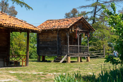 House on field against sky