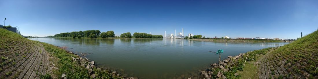 Panoramic view of river against sky