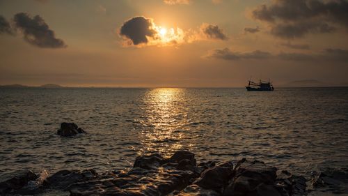 Scenic view of sea against sky during sunset