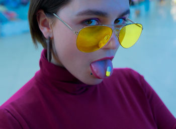 Close-up portrait of boy wearing sunglasses