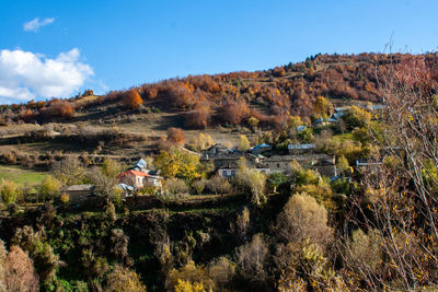 Scenic view of landscape against sky during autumn