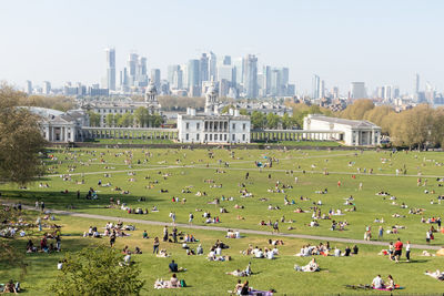Group of people in front of buildings