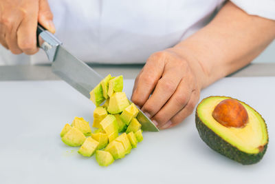 Midsection of man preparing food