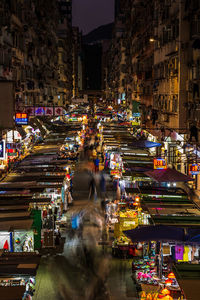 High angle view of illuminated city street at night