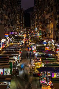 High angle view of illuminated city street at night