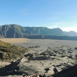 Scenic view of landscape and mountains against sky