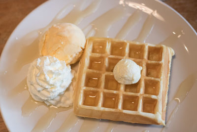 High angle view of ice cream in plate on table