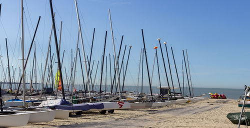 Boats moored at harbor