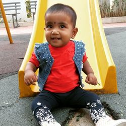 Portrait of smiling boy in playground