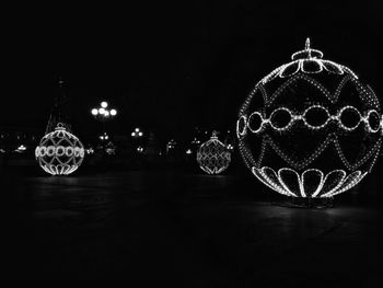 Close-up of illuminated lighting equipment in water