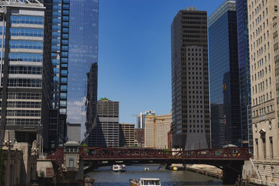 Modern buildings in city against sky