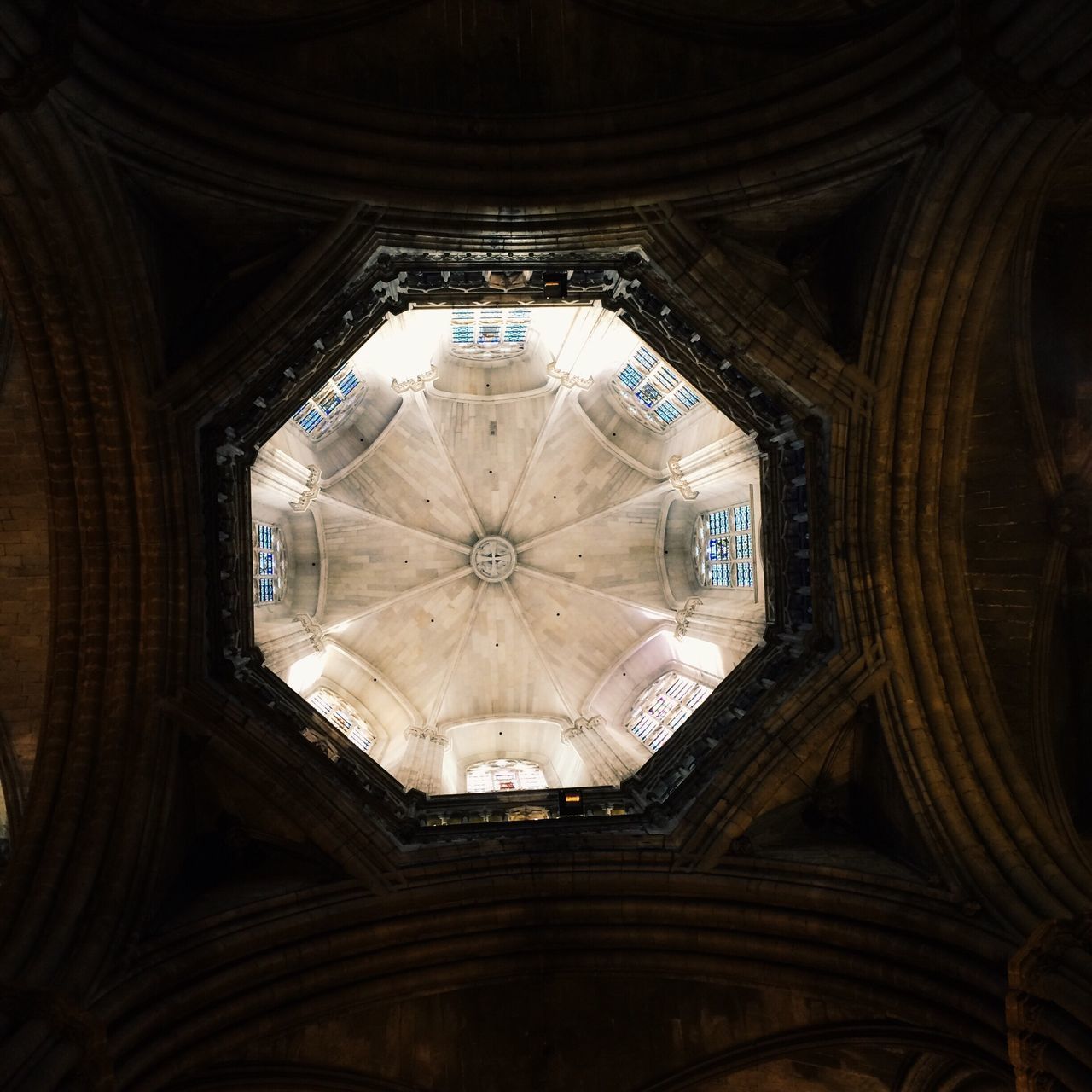 ceiling, indoors, architecture, built structure, low angle view, directly below, dome, architectural feature, skylight, geometric shape, cupola, history, architectural design, place of worship, historic, no people, electric light