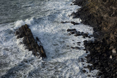 High angle view of rock formation at sea shore