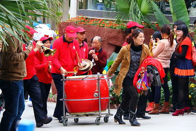 Close-up of people in red pool