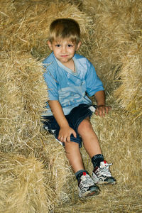 Portrait of boy on field