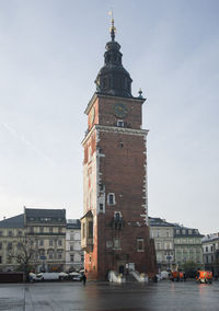 View of old building in city against sky