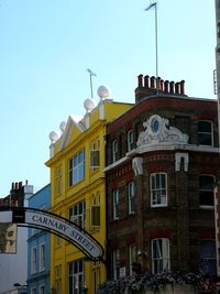 Low angle view of building against clear sky