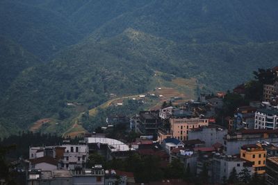 High angle view of town against mountains