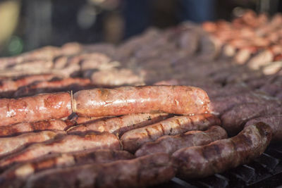 Close-up of sausages on barbecue