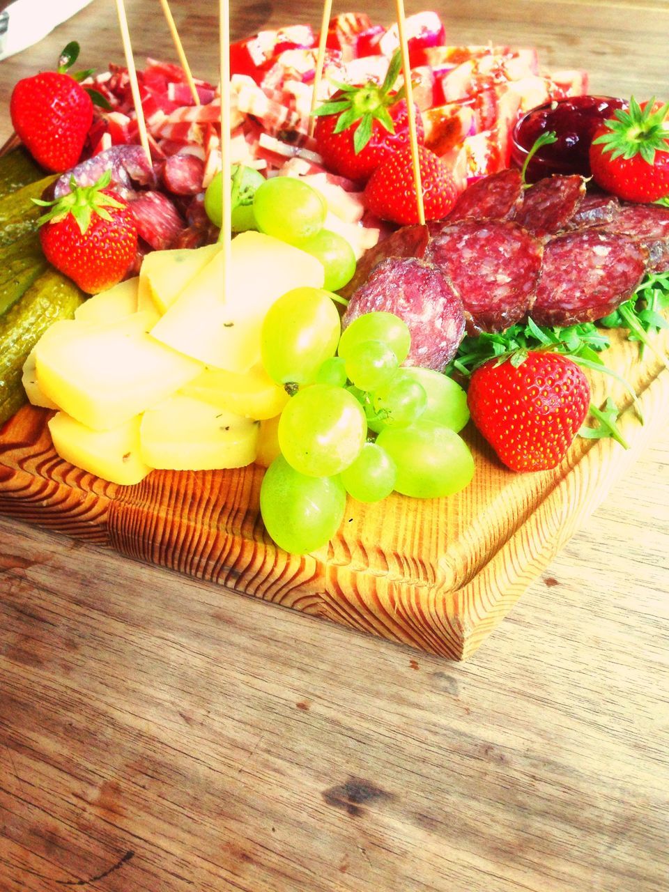 food and drink, food, freshness, healthy eating, fruit, indoors, still life, table, wood - material, high angle view, red, strawberry, variation, large group of objects, vegetable, ripe, abundance, organic, juicy, no people