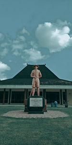 Statue of buddha against sky