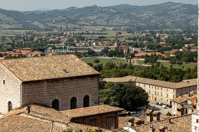 Photo of the beautiful medieval fountain and houses 