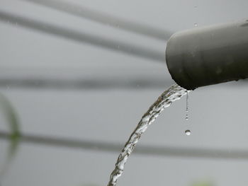 Close-up of raindrops on umbrella