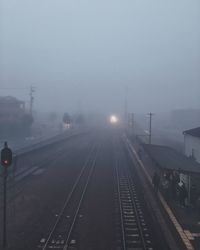 High angle view of railroad tracks at night
