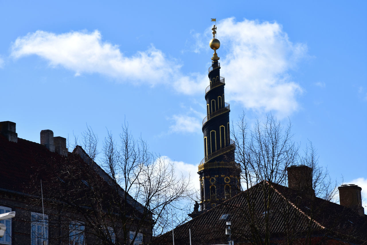 LOW ANGLE VIEW OF CHURCH AND BUILDINGS AGAINST SKY