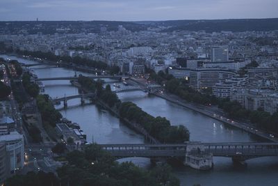 High angle view of bridge over river in city against sky