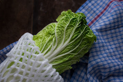 High angle view of chinese cabbage on napkin