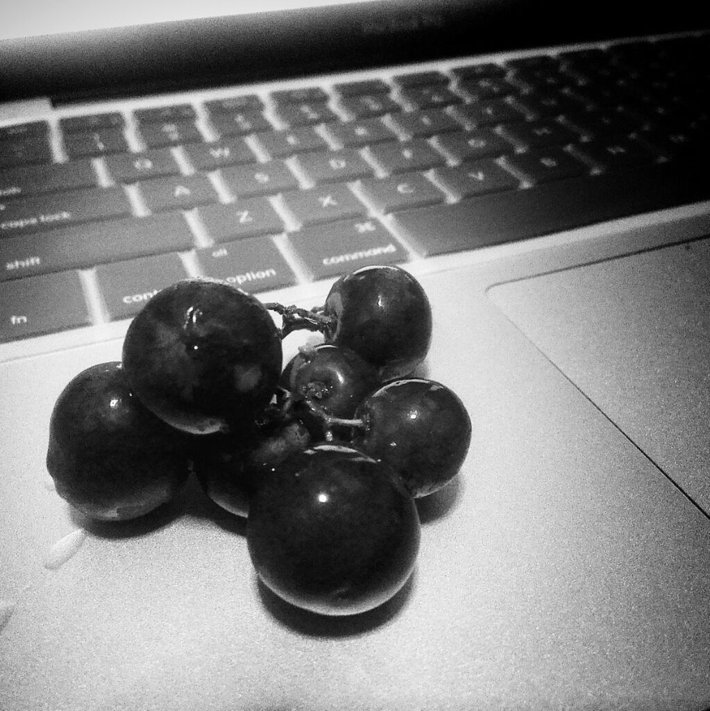 indoors, food and drink, fruit, food, still life, table, high angle view, close-up, freshness, healthy eating, sweet food, no people, focus on foreground, selective focus, black color, home interior, berry fruit, shadow, blueberry, ball