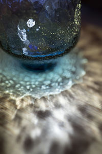 High angle view of drinking glass on table