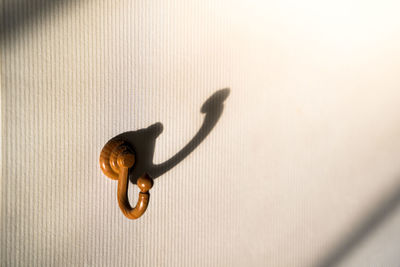 High angle view of metal ring on wood