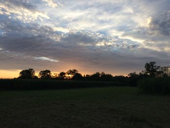 Scenic view of landscape against sky during sunset