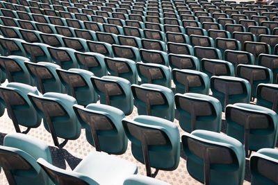 Empty chairs in stadium